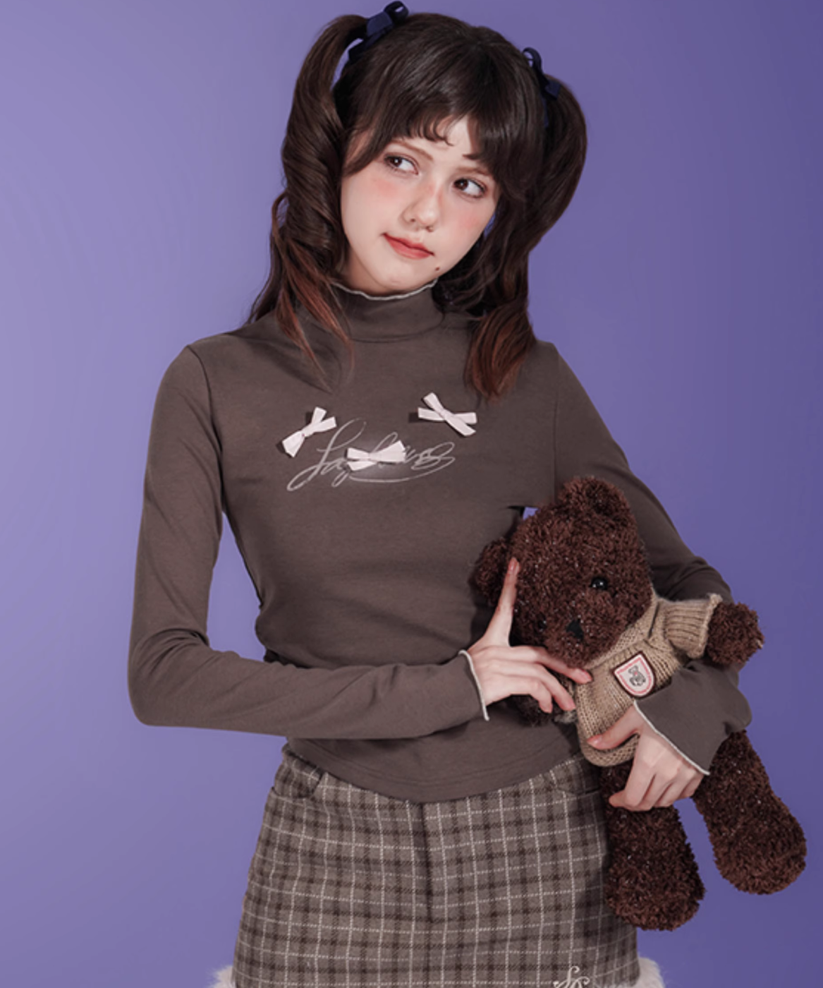 ハーフネックスリムリボントップス