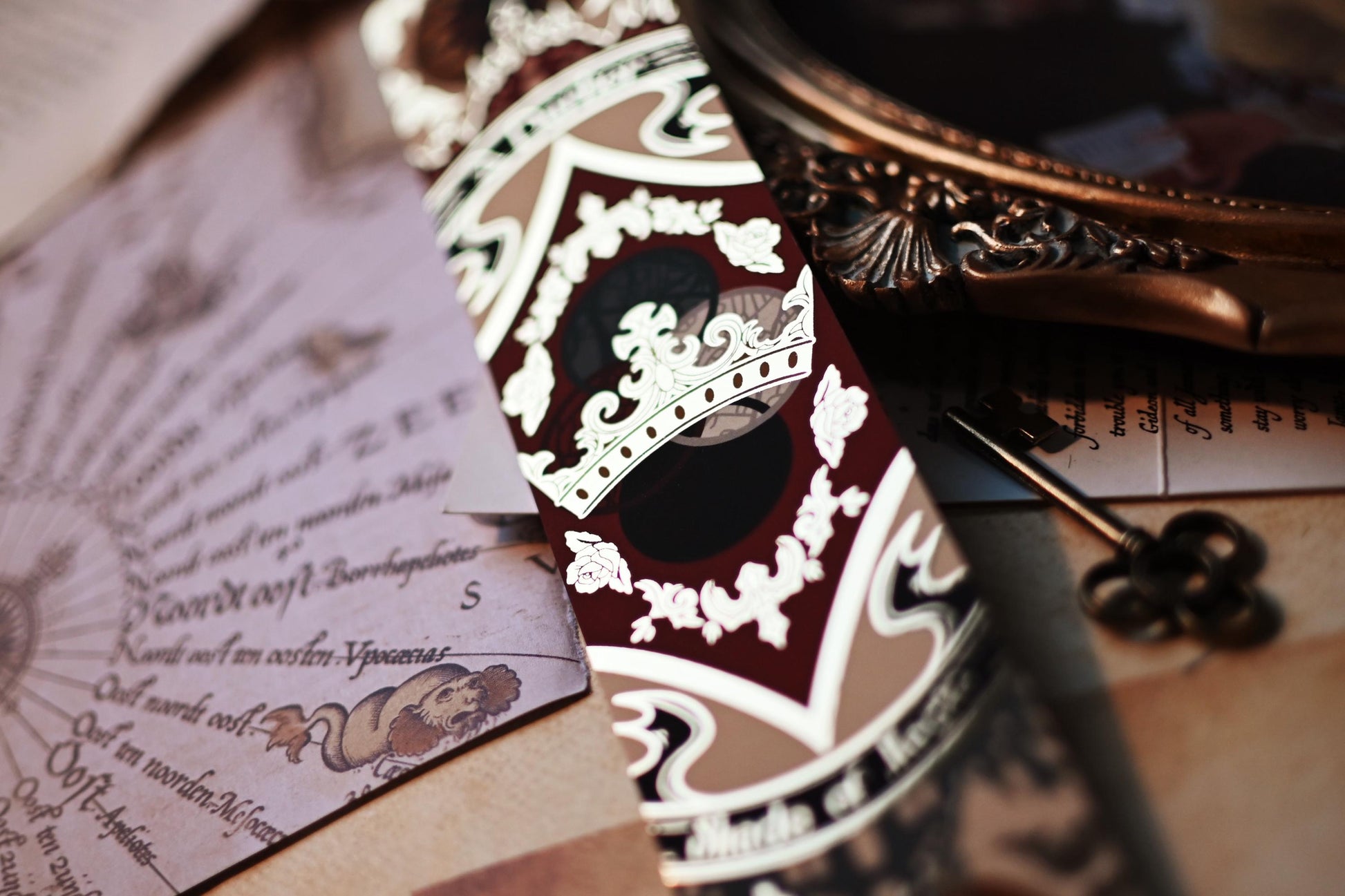 A Darker Shade of Magic by V.E Schwab inspired bookmark featuring the close up detailing of the gold centre.