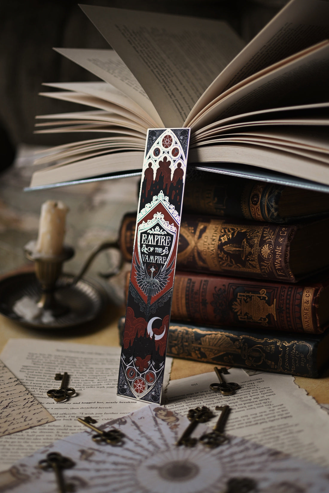 Decorative bookmark with intricate design on top of an open book